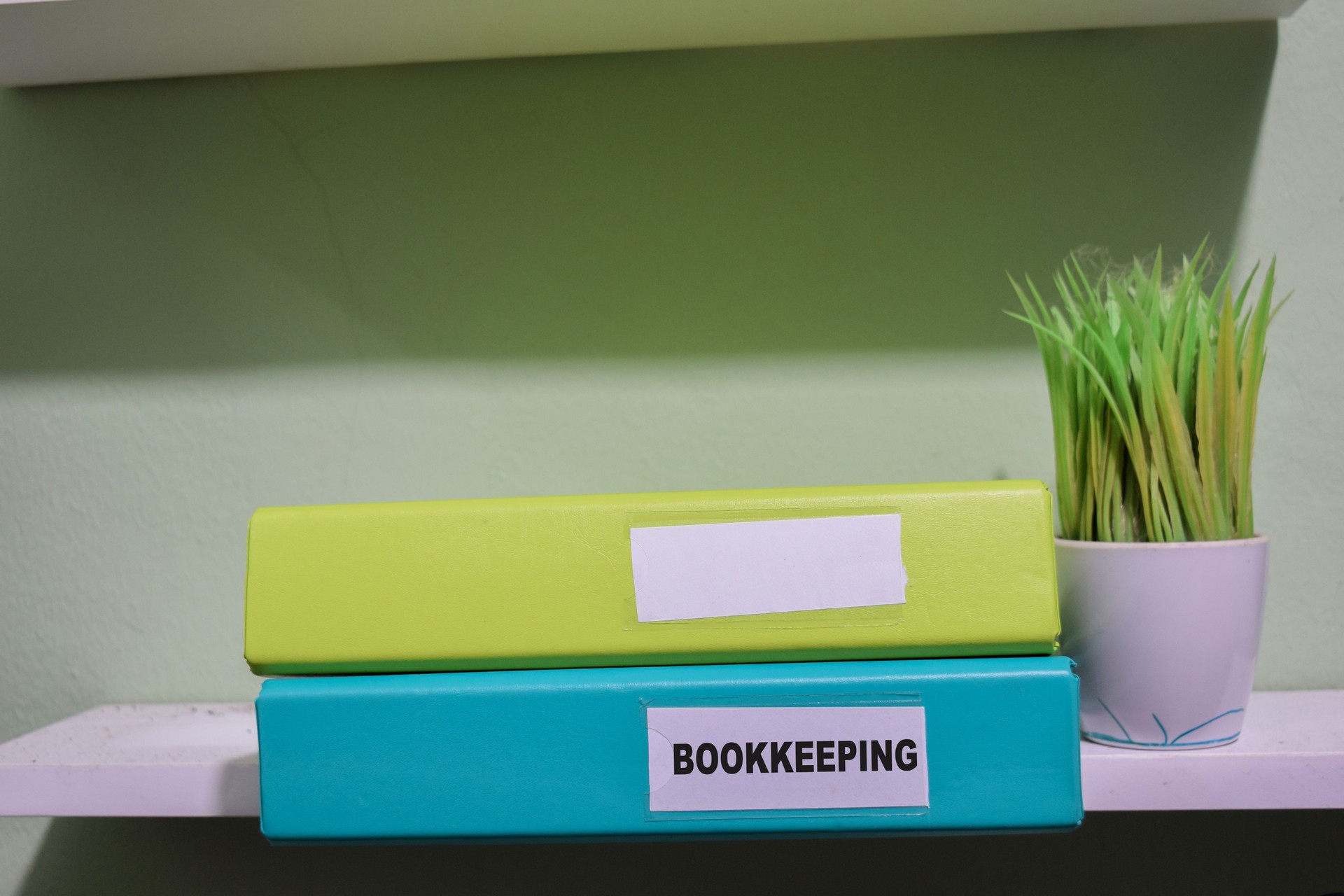 folders with the label Bookkeeping, Business management concept